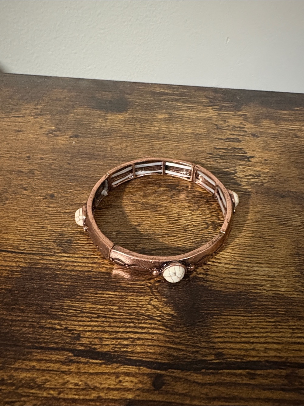 Copper-Tone Bangle Bracelet with Cream Stone Accents